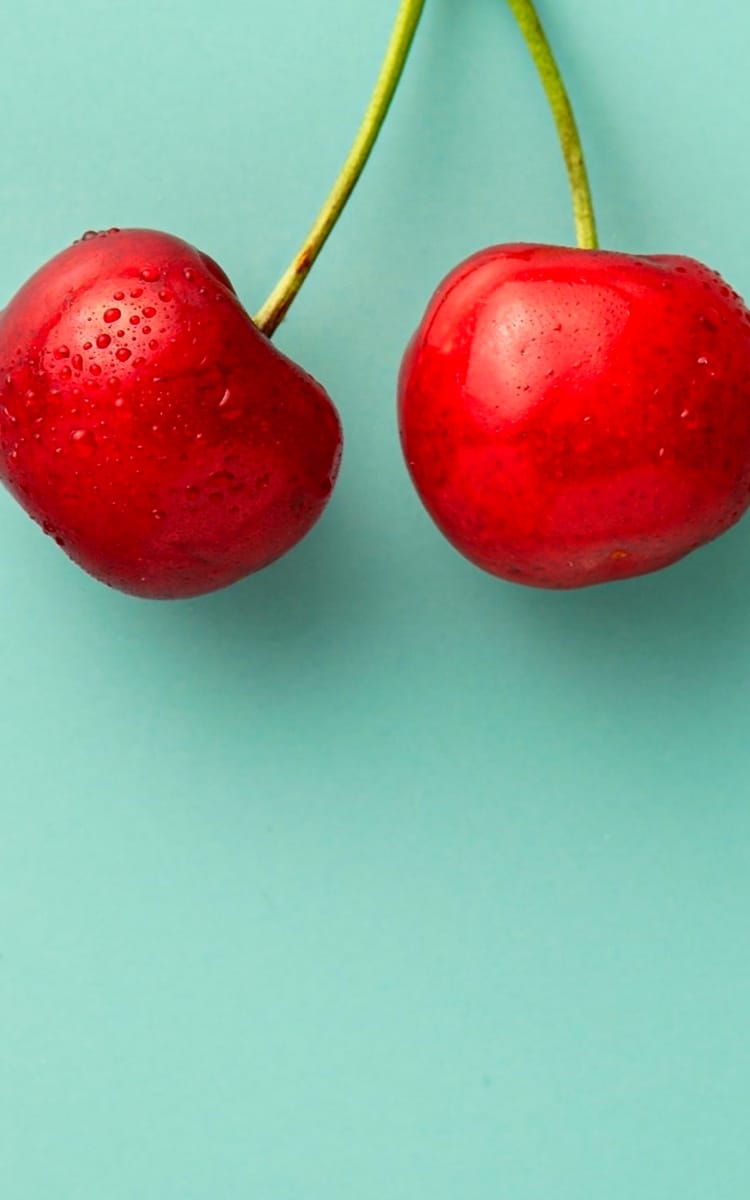 Cherry on a green background